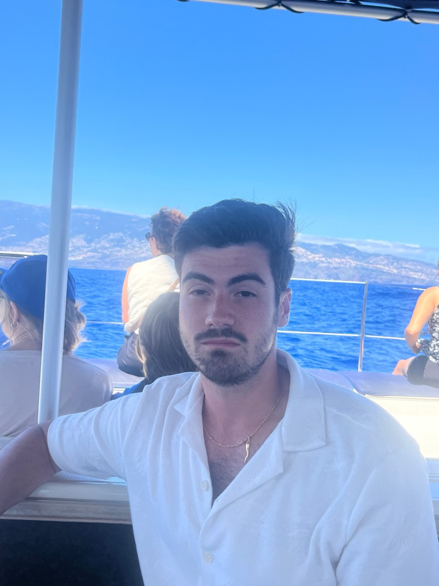 Matt Kahler staring blankly on a boat