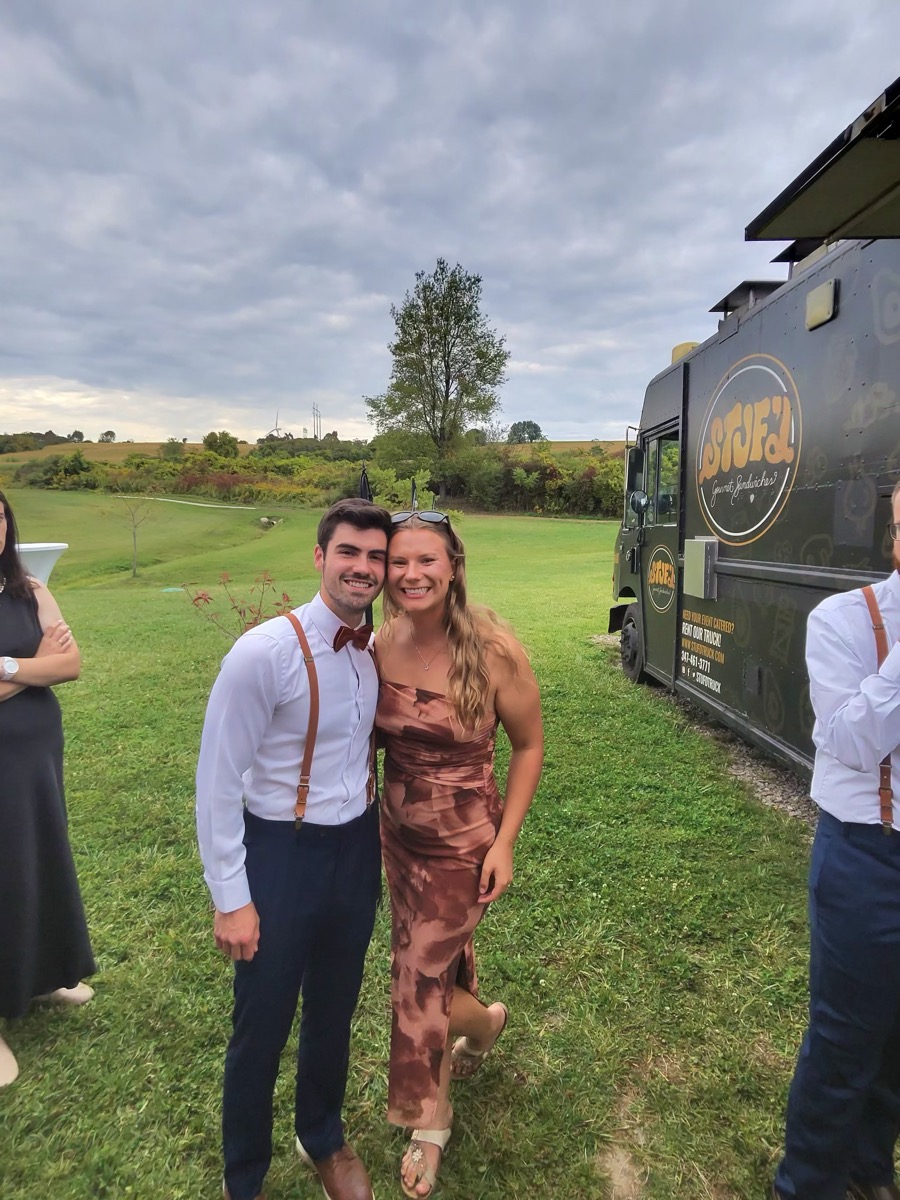 Matt Kahler in suspenders and a bow tie at a wedding